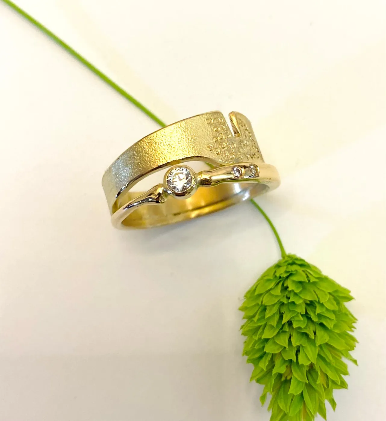 Gold ring set with small stones
