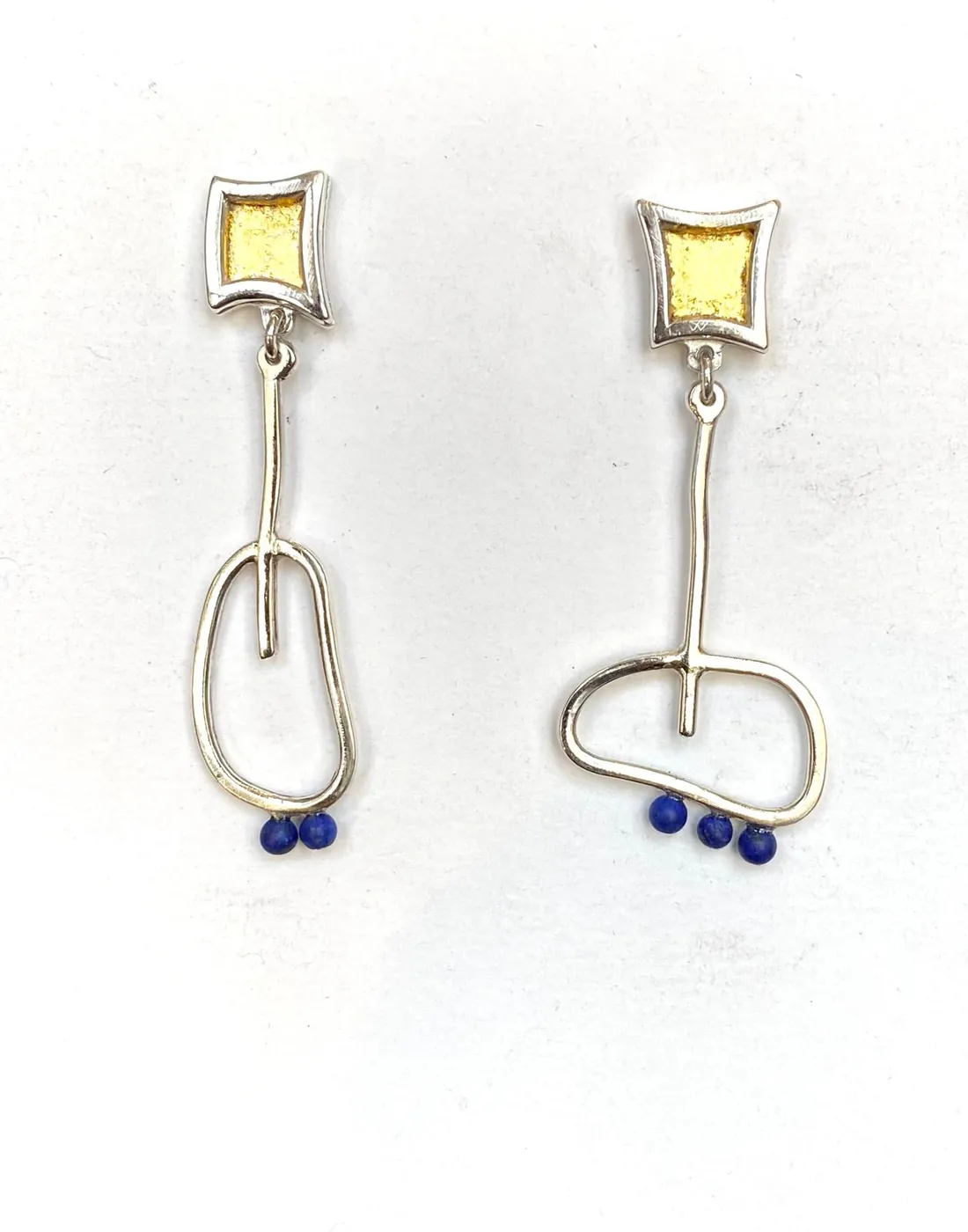 Silver earrings with small blue beads