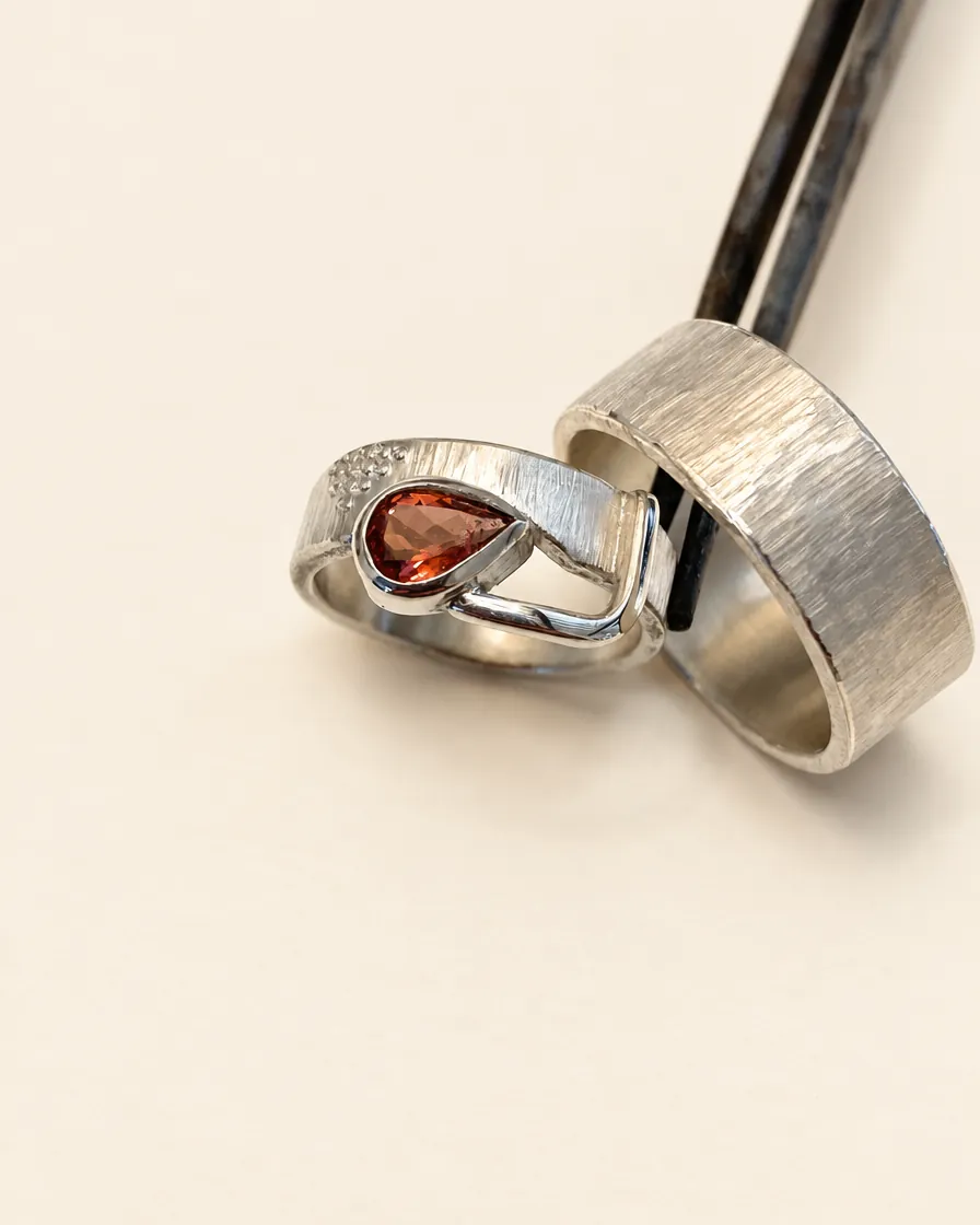 Silver wedding rings on a ring mandrel
